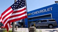 GM profit shrinks despite stronger sales